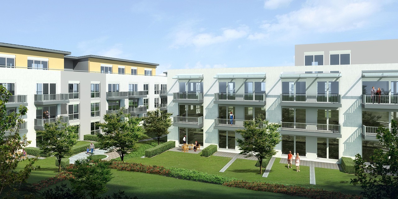 Moderne Mehrfamilienhäuser mit Grünflächen